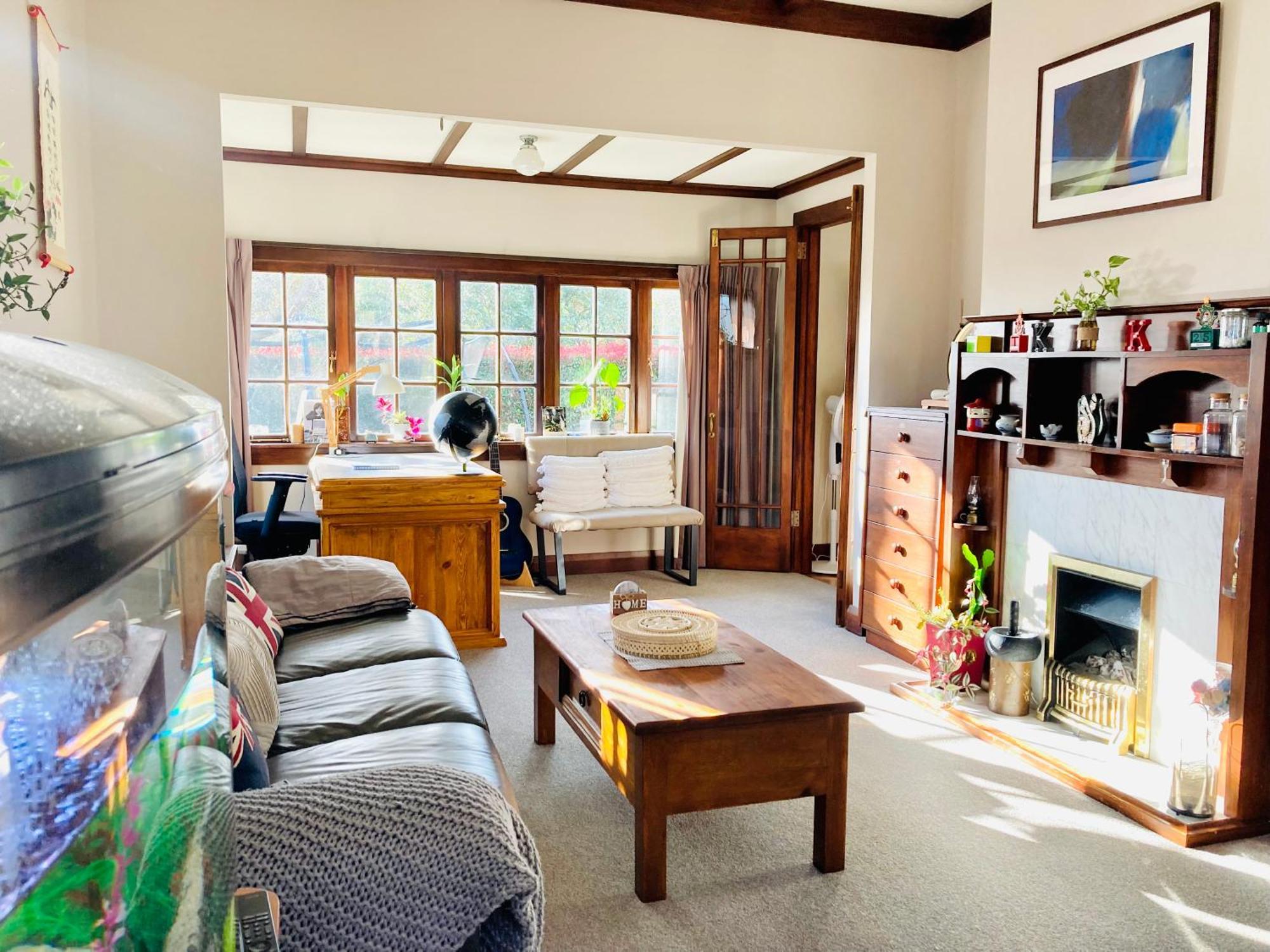 Spacious And Sunny Master Bedroom With Shared Bathrooms
